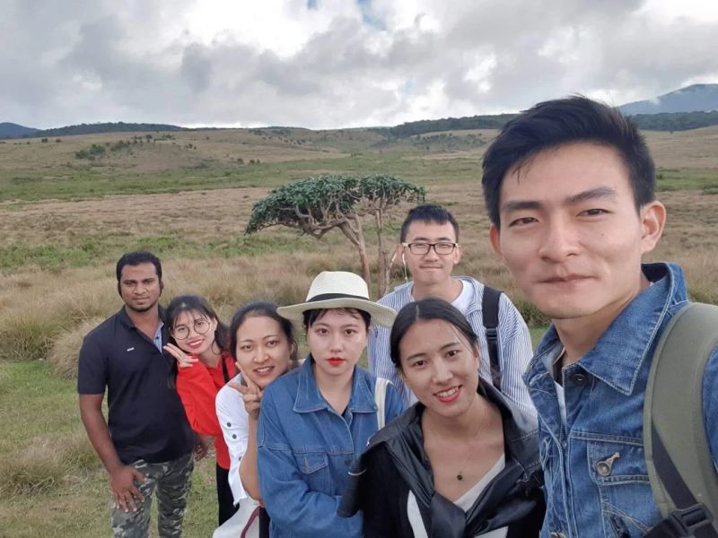 Chinthaka with a group of tourists at Horton Plains