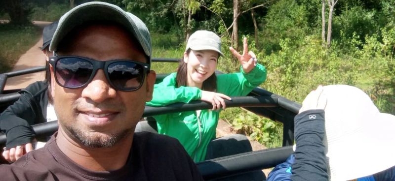 Chinthaka with a traveler on safari