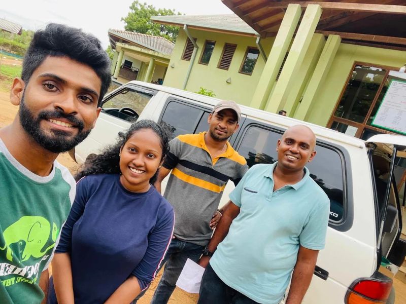 Chinthaka and team with the cab van
